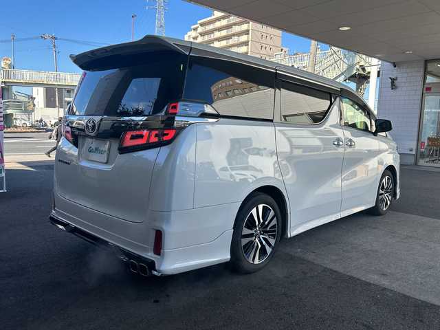 トヨタ ヴェルファイア Z Gエディション 京都府 2018(平30)年 8万km ホワイトパールクリスタルシャイン 社外メモリナビ/フルセグテレビ/バックカメラ/Bluetooth/フリップダウンモニター/ウィンカーミラー/オットマン/キャプテンシート/クルーズコントロール/ドアバイザー/プッシュスタート/両側パワースライドドア/パワーバックドア/ETC/デジタルインナーミラー/モデリスタエアロ