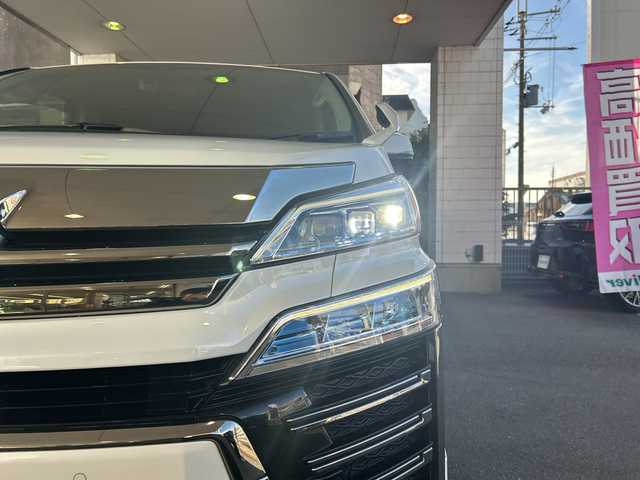 トヨタ ヴェルファイア Z Gエディション 京都府 2018(平30)年 8万km ホワイトパールクリスタルシャイン 社外メモリナビ/フルセグテレビ/バックカメラ/Bluetooth/フリップダウンモニター/ウィンカーミラー/オットマン/キャプテンシート/クルーズコントロール/ドアバイザー/プッシュスタート/両側パワースライドドア/パワーバックドア/ETC/デジタルインナーミラー/モデリスタエアロ