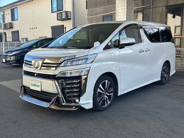 トヨタ ヴェルファイア Z Gエディション 京都府 2018(平30)年 8万km ホワイトパールクリスタルシャイン 社外メモリナビ/フルセグテレビ/バックカメラ/Bluetooth/フリップダウンモニター/ウィンカーミラー/オットマン/キャプテンシート/クルーズコントロール/ドアバイザー/プッシュスタート/両側パワースライドドア/パワーバックドア/ETC/デジタルインナーミラー/モデリスタエアロ