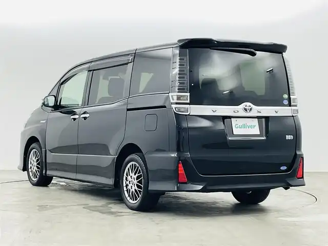 トヨタ ヴォクシー ハイブリッド ZS 煌 福島県 2020(令2)年 6.3万km ブラック トヨタセーフティC/・プリクラッシュセーフティ/・レーンディパーチャーアラート/・オートマチックハイビーム/社外ナビ/・フルセグTV/BT/CD/DVD/AM・FM/HDMI/AUX/・バックカメラ/・社外後方モニター/・ETC/クルーズコントロール/革巻きステアリング/・ステアリングスイッチ/シートヒーター（D＋N）/・エアーシート（D＋N）/プッシュスタート/・スマートキー/LEDライト/・オートライト/電動格納ウィンカーミラー/ドアバイザー/純正フロアマット