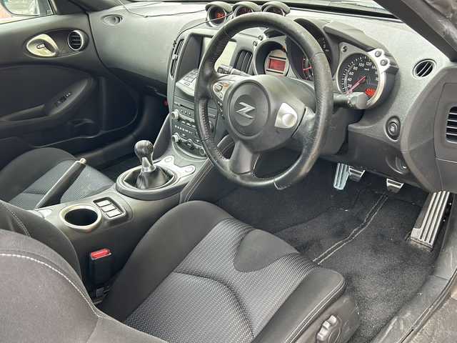 日産 フェアレディ Ｚ バージョンS 鹿児島県 2008(平20)年 10.5万km ブレードシルバー 禁煙車　/純正ナビ　/・フルセグＴＶ　/・ＴＶキャンセラー　/社外エアロ　/社外リアスポイラー　/ビルドインＥＴＣ　/ＭＴ車　/純正１９インチアルミ　/キセノンヘッドライト　/純正フロアマット　/社外前方ドラレコ　/電格ミラー/スマートキー