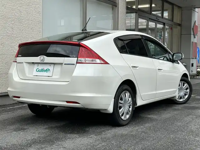 ホンダ インサイト L 大阪府 2010(平22)年 6.7万km プレミアムホワイトパール 7インチSDナビ/(Bluetooth/フルセグTV/CD/DVD)/バックカメラ/アイドリングストップ/盗難防止装置/ドライブレコーダー/純正ETC/純正フロアマット/オートエアコン/キセノンヘッドライト/オートライト/パワーステアリング/パワーウィンドウ/保証書/取扱説明書/スぺキー×１