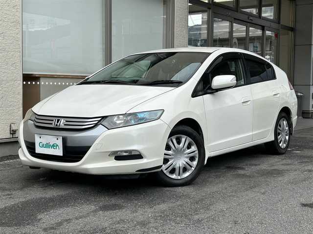 ホンダ インサイト L 大阪府 2010(平22)年 6.7万km プレミアムホワイトパール 7インチSDナビ/(Bluetooth/フルセグTV/CD/DVD)/バックカメラ/アイドリングストップ/盗難防止装置/ドライブレコーダー/純正ETC/純正フロアマット/オートエアコン/キセノンヘッドライト/オートライト/パワーステアリング/パワーウィンドウ/保証書/取扱説明書/スぺキー×１