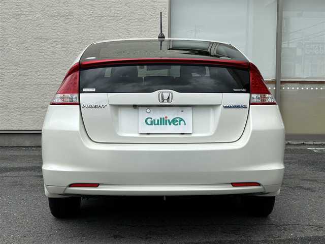 ホンダ インサイト L 大阪府 2010(平22)年 6.7万km プレミアムホワイトパール 7インチSDナビ/(Bluetooth/フルセグTV/CD/DVD)/バックカメラ/アイドリングストップ/盗難防止装置/ドライブレコーダー/純正ETC/純正フロアマット/オートエアコン/キセノンヘッドライト/オートライト/パワーステアリング/パワーウィンドウ/保証書/取扱説明書/スぺキー×１