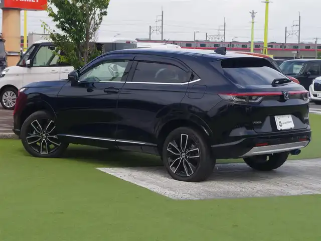 ホンダ ヴェゼル ハイブリッド e:HEV Z 千葉県 2021(令3)年 2万km クリスタルブラックパール ホンダセンシング/・衝突軽減ブレーキ（CMBS）/・車線維持支援システム（LKAS）/・アダプティブクルーズコントロール（ACC）/・後方誤発進抑制機能/・誤発進抑制機能/・ブラインドスポットインフォメーション/パワーバックドア/純正コネクトナビ/地デジTV/【Bluetooth接続】/【Apple CarPlay　Android Auto対応】/バックカメラ/ドライブレコーダー（前後撮影）/ワイヤレス充電/ハーフレザーシート/革巻きステアリング/ステアリングヒーター/ステアリングスイッチ/ETC（2.0）/LEDヘッドライト/フォグライト/ウインカーミラー/コーナーセンサー/純正18インチアルミホイル/サイド/カーテンエアバッグ/Honda スマートキー