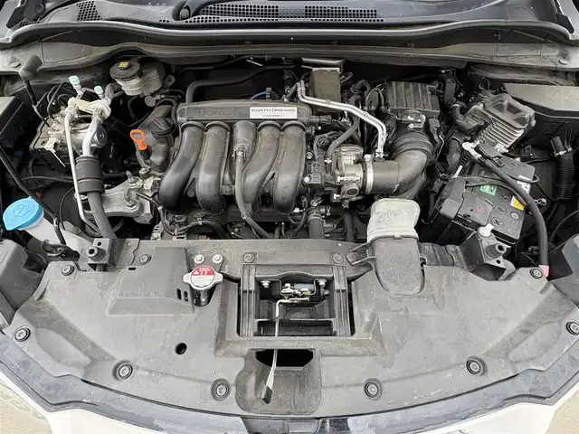 ホンダ ヴェゼル G ホンダセンシング 岩手県 2018(平30)年 6.9万km クリスタルブラックパール 禁煙車/4WD/追従型クルーズコントロール/純正ナビ/→フルセグTV/Bluetooth/CD/DVD/FM/AM/バックカメラ/ステアリングスイッチ/レーンキープアシスト/衝突軽減システム/横滑り防止装置/電子パーキング/オートブレーキホールド/オートライト/LEDヘッドライト/〇プッシュスタート/〇電動格納ミラー/〇ウィンカーミラー/〇ドアバイザー/〇フロアマット/〇シガーソケット/〇スマートキー/ビルトインETC