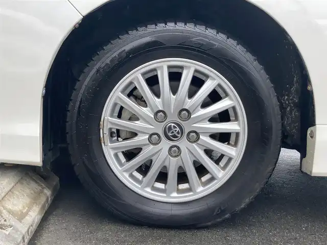 トヨタ ヴォクシー ハイブリッド V 静岡県 2014(平26)年 7.5万km ホワイトパールクリスタルシャイン 社外メモリーナビ(AVIC-RW710)/　AM FM CD DVD Bluetooth SD/ビルトインETC/LEDオートヘッドランプ/シートヒーター(前席)/両側パワースライドドア/クルーズコントロール/革巻きステアリング/ステアリングスイッチ/スマートキー＆プッシュスタート/純正15インチアルミホイール/リアロールサンシェード/フルセグTV/バックモニター/前後方ドライブレコーダー