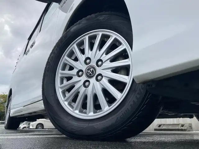 トヨタ ヴォクシー ハイブリッド V 静岡県 2014(平26)年 7.5万km ホワイトパールクリスタルシャイン 社外メモリーナビ(AVIC-RW710)/　AM FM CD DVD Bluetooth SD/ビルトインETC/LEDオートヘッドランプ/シートヒーター(前席)/両側パワースライドドア/クルーズコントロール/革巻きステアリング/ステアリングスイッチ/スマートキー＆プッシュスタート/純正15インチアルミホイール/リアロールサンシェード/フルセグTV/バックモニター/前後方ドライブレコーダー