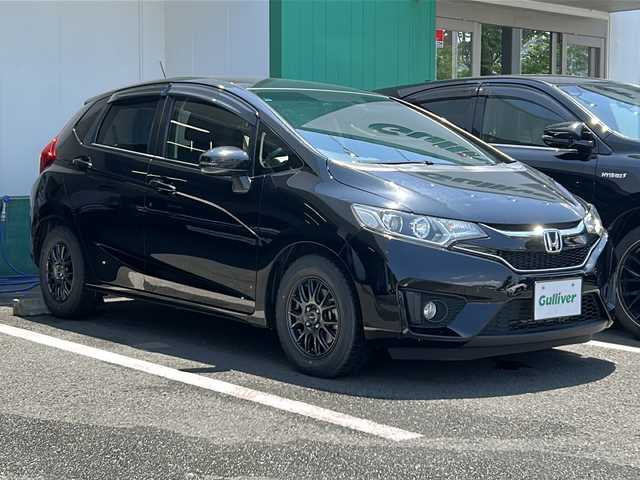 ホンダ フィット 13G Lパッケージ 京都府 2016(平28)年 3.8万km クリスタルブラックパール ワンオーナー/純正ナビ/　(AM/FM/TV/BT/USB/iPod/CD)/バックカメラ/ETC/クルーズコントロール/プッシュスタート/スマートキー/LEDライト/オートライト/純正フロアマット/横滑り防止装置/取扱説明書/保証書/ドアバイザー