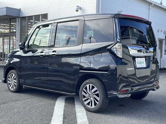 トヨタ ルーミー カスタムG 東京都 2024(令6)年 0.8万km ブラックマイカメタリック ワンオーナー/純正9インチフルセグTVディスプレイオーディオ/(Bluetooth/USB/iPod)/純正14インチアルミホイール/両側パワースライドドア/追従型クルーズコントロール/アイドリングストップ/横滑り防止装置/オートライト/スマートキー/スペアキー1本/取説書/保証書