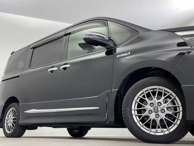 トヨタ ヴォクシー ハイブリッド ZS 煌Ⅱ 新潟県 2019(平31)年 7万km ブラック ALPAINE11型ナビ/BT/CD/DVD/フルセグ/ALPAINE12.8型フリップダウンモニター/バックカメラ/ドライブレコーダー前/トヨタセーフティセンス/コーナーセンサー前後/両側パワースライドドア/LEDヘッドライト/フォグランプ/純正フロアマット/シートヒーター/モデリスタエアロ