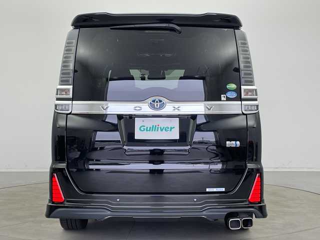 トヨタ ヴォクシー ハイブリッド ZS 煌Ⅱ 新潟県 2019(平31)年 7万km ブラック ALPAINE11型ナビ/BT/CD/DVD/フルセグ/ALPAINE12.8型フリップダウンモニター/バックカメラ/ドライブレコーダー前/トヨタセーフティセンス/コーナーセンサー前後/両側パワースライドドア/LEDヘッドライト/フォグランプ/純正フロアマット/シートヒーター/モデリスタエアロ