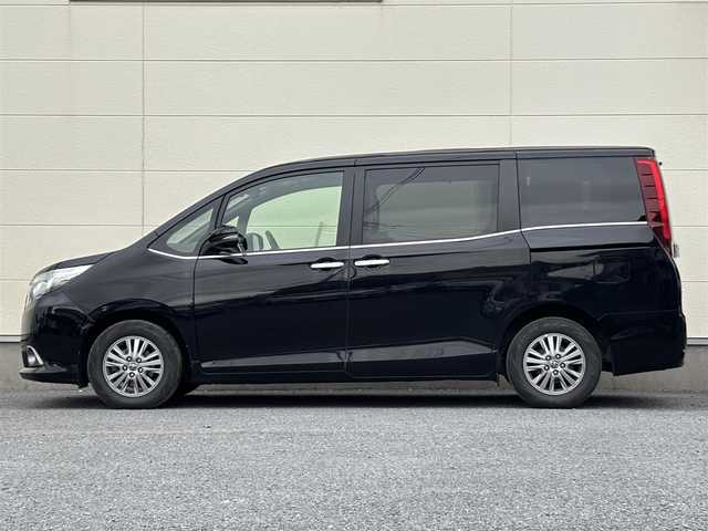 トヨタ エスクァイア Gi 茨城県 2014(平26)年 7.4万km ブラック 純正ナビ/ (AM/FM/CD/Bluetooth/フルセグTV)/バックカメラ/フリップダウンモニター/クルーズコントロール/スペアキー/ビルトインETC/ドライブレコーダー(前後)/両側パワースライドドア/シートヒーター/オートライト/衝突被害軽減ブレーキ/純正アルミホイール/純正フロアマット