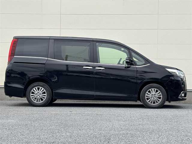 トヨタ エスクァイア Gi 茨城県 2014(平26)年 7.4万km ブラック 純正ナビ/ (AM/FM/CD/Bluetooth/フルセグTV)/バックカメラ/フリップダウンモニター/クルーズコントロール/スペアキー/ビルトインETC/ドライブレコーダー(前後)/両側パワースライドドア/シートヒーター/オートライト/衝突被害軽減ブレーキ/純正アルミホイール/純正フロアマット