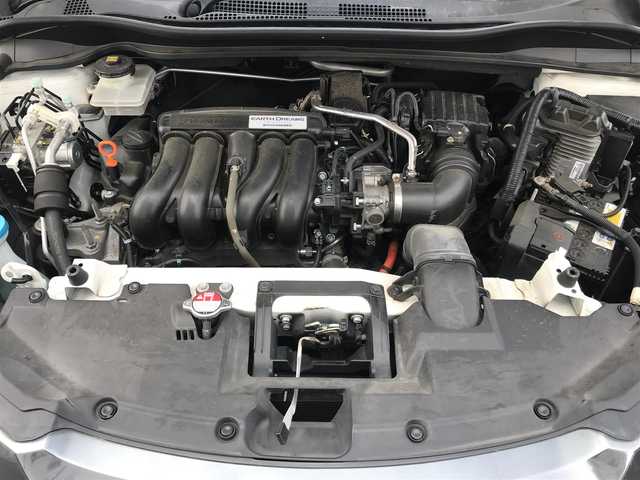 ホンダ ヴェゼル ハイブリッド Z 千葉県 2015(平27)年 14.4万km ホワイトオーキッドパール (株)IDOMが運営する【じしゃロン柏店】の自社ローン対象車両になります。こちらは現金ご利用時の価格です。/自社ローンご希望の方は別途その旨お申付け下さい。//禁煙車/純正フルセグナビ/（CD/DVD/AM/FMラジオ）/(Bluetooth)/スマートキー/プッシュスタート/バックカメラ/ＥＴＣ/クルーズコントロール/シティブレーキアクティブシステム/ルーフレール/シートヒーター/チップアップシート/ステアリングリモコン/電動格納ドアミラー/パワーウインドウ/オートライト/自動防眩ミラー