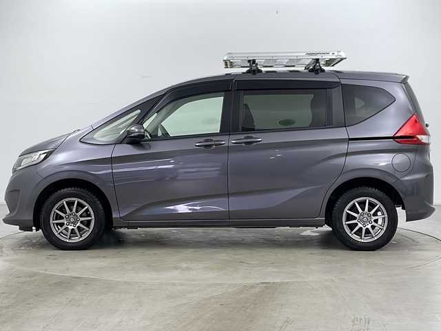 ホンダ フリード G ホンダセンシング 道央・札幌 2018(平30)年 5.4万km モダンスティールM ・4WD/・純正ナビ/CD/DVD/BT/・フルセグTV/・バックカメラ/・ホンダセンシング/　衝突軽減ブレーキ/　誤発進抑制/　アダプティブクルーズコントロール/　車線維持支援/　歩行者事故低減ステアリング/　路外逸脱抑制/　先行車発進お知らせ/　標識認識/・純正エンジンスターター /・ビルトインETC/・前席シートヒーター /・アイドリングストップ/・社外ルーフデッキ/・社外LEDヘッドライト/・社外レーダー/・後席シェード/・スペアキー/・15インチ社外AW冬タイヤ/・積込夏タイヤ/・取扱説明書/・保証書