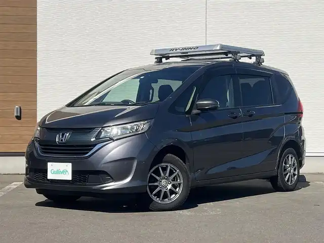 ホンダ フリード G ホンダセンシング 秋田県 2018(平30)年 5.4万km モダンスティールM ４WD/両側パワースライドドア/ホンダセンシング/衝突軽減システム/LEDヘッドライト/純正メモリナビ/フルセグ/バックカメラ/社外アルミ/スマートキー/アイドリングストップ/プッシュスタート/アダプティブ・クルーズコントロール追従走行有/レーンキープアシスト/ステアリングスイッチ/純正エンジンスターター/前席シートヒーター/ETC/ルーフキャリア/ルーフラック/社外ドアバイザー/ウォークスルー/オートエアコン/ヘッドライトレベライザー/横滑り防止/盗難防止装置/寒冷地仕様/電動格納ウィンカーミラー/保証書/取扱説明書/記録簿/スペアキー1本有