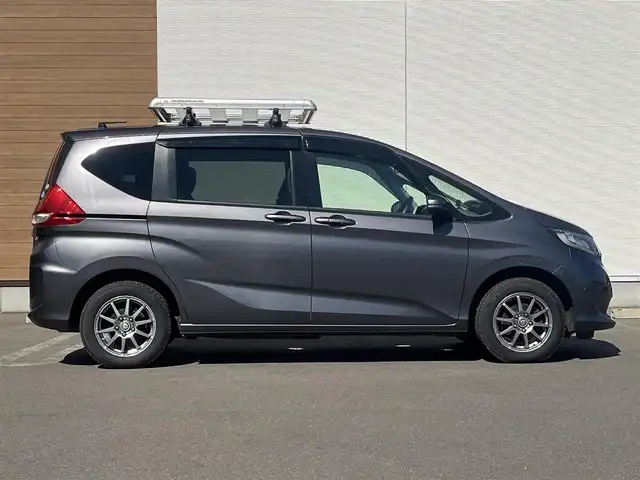 ホンダ フリード G ホンダセンシング 秋田県 2018(平30)年 5.4万km モダンスティールM ４WD/両側パワースライドドア/ホンダセンシング/衝突軽減システム/LEDヘッドライト/純正メモリナビ/フルセグ/バックカメラ/社外アルミ/スマートキー/アイドリングストップ/プッシュスタート/アダプティブ・クルーズコントロール追従走行有/レーンキープアシスト/ステアリングスイッチ/純正エンジンスターター/前席シートヒーター/ETC/ルーフキャリア/ルーフラック/社外ドアバイザー/ウォークスルー/オートエアコン/ヘッドライトレベライザー/横滑り防止/盗難防止装置/寒冷地仕様/電動格納ウィンカーミラー/保証書/取扱説明書/記録簿/スペアキー1本有