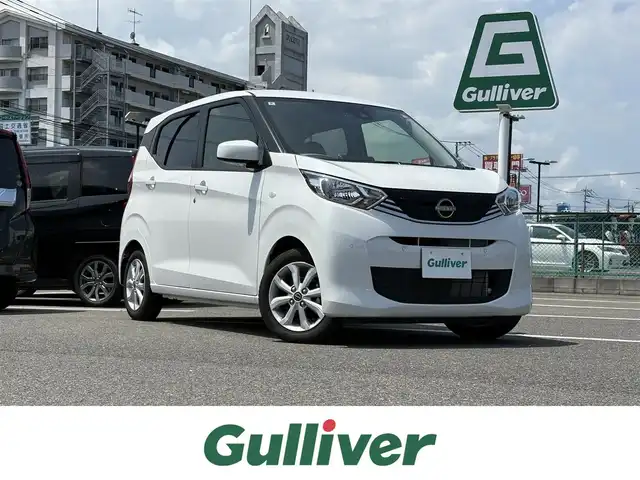 日産 デイズ X 大分県 2024(令6)年 0.6万km ホワイトパール 純正９型ＤＡナビ　フルセグＴＶ　Ｂｌｕｅｔｏｏｔｈ　バックカメラ　ＥＴＣ　ＬＥＤオートライト　純正前後ドラレコナビ連動　エマージェンシーブレーキ　衝突軽減　プッシュスタート　純正１４インチアルミ　ワンオナ　保証書　禁煙車