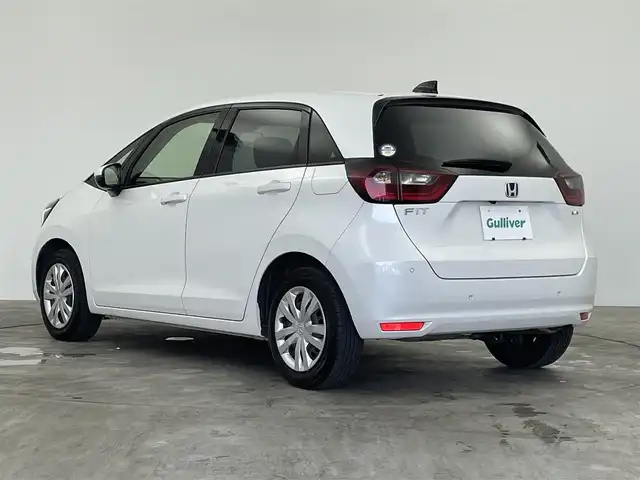ホンダ フィット e:HEVホーム 群馬県 2022(令4)年 6.1万km プラチナホワイトパール 純正７インチナビ　バックカメラ　アダプティブクルーズコントロール　ＬＥＤライト　ＡＨＢ　ハーフレザーシート　ステアリングリモコン　走行運転支援　オートブレーキホールド　スマートキー　ＥＴＣ　禁煙