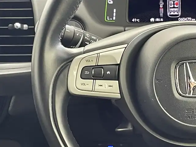 ホンダ フィット e:HEVホーム 群馬県 2022(令4)年 6.1万km プラチナホワイトパール 純正７インチナビ　バックカメラ　アダプティブクルーズコントロール　ＬＥＤライト　ＡＨＢ　ハーフレザーシート　ステアリングリモコン　走行運転支援　オートブレーキホールド　スマートキー　ＥＴＣ　禁煙