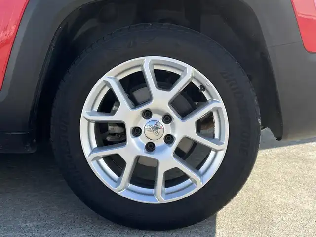 クライスラー・ジープ ジープ レネゲード リミテッド 東京都 2021(令3)年 4万km 赤 純正ナビ/バックカメラ/Bluetooth/ブラインドスポットモニター/ルーフレール/ビルトインETC2.0/ドライブレコーダー/LEDヘッドライト/プッシュスタート/インテリキー/アダプティブクルーズコントロール/ブラックレザーシート