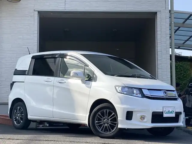 ホンダ フリード スパイク G プレミアムエディション 大分県 2016(平28)年 9.7万km ホワイトオーキッドパール ワンオーナー /両側パワースライドドア /社外15インチアルミホイール/オートライト/社外ドラレコ/純正ビルトインETC/ナビ/フルセグTV/Bluetooth/5月3日から5月7日までお休みの為、書類発送及び車両搬出は5月8日以降になります。
