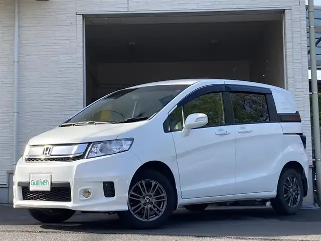 ホンダ フリード スパイク G プレミアムエディション 大分県 2016(平28)年 9.7万km ホワイトオーキッドパール ワンオーナー /両側パワースライドドア /社外15インチアルミホイール/オートライト/社外ドラレコ/純正ビルトインETC/ナビ/フルセグTV/Bluetooth/5月3日から5月7日までお休みの為、書類発送及び車両搬出は5月8日以降になります。