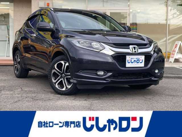 ホンダ ヴェゼル ハイブリッド Z 静岡県 2014(平26)年 13万km ルーセブラックM (株)IDOMが運営する【じしゃロン焼津店】の自社ローン専用車両になります。こちらは現金またはオートローンご利用時の価格です。自社ローンご希望の方は別途その旨お申付け下さい/【じしゃロン個店占有の為　落札禁止】/Carrozzeriaナビ(AVIC-ZH007)/FM/AM/CD/DVD/フルセグ/SD/Bluetooth/衝突軽減（シティブレーキアクティブシステム）/横滑り防止/クルーズコントロール/バックカメラ/ETC/パドルシフト/ステアリングリモコン/コンビシート/前席シートヒーター/LEDヘッドライト/オートライト/フォグランプ/ドアバイザー/社外シフトノブ/プッシュスタート/スマートキー/スペアキー１本/取説