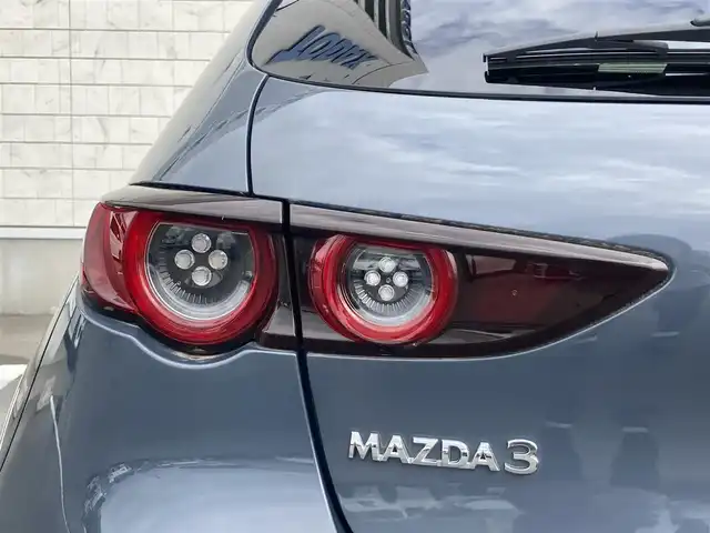 マツダ マツダ３ファストバック 15S ツーリング 静岡県 2020(令2)年 3.3万km ポリメタルグレーM i-ACTIVSENSE/純正SDナビ/　AM FM CD DVD Bluetooth USB HDMI/フルセグTV/ビルトインETC/LEDオートヘッドランプ/レーダークルーズコントロール/ヘッドアップディスプレイ/純正18インチアルミホイール/スマートキー2本/前後方クリアランスソナー/ワンオーナー/アラウンドビューモニター/前後方ドライブレコーダー