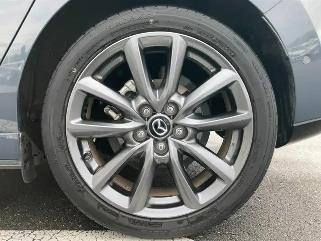 マツダ マツダ３ファストバック 15S ツーリング 静岡県 2020(令2)年 3.3万km ポリメタルグレーM i-ACTIVSENSE/純正SDナビ/　AM FM CD DVD Bluetooth USB HDMI/フルセグTV/ビルトインETC/LEDオートヘッドランプ/レーダークルーズコントロール/ヘッドアップディスプレイ/純正18インチアルミホイール/スマートキー2本/前後方クリアランスソナー/ワンオーナー/アラウンドビューモニター/前後方ドライブレコーダー