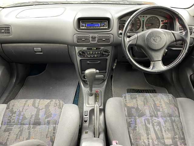トヨタ カローラ GT 大阪府 1998(平10)年 17.3万km シルバーM CDユニット(MITSUBISHI/CDH77)/純正リアスポイラー/AAC/シガーライター/ハロゲンヘッドライト