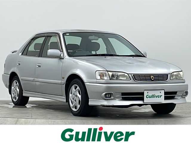 トヨタ カローラ GT 大阪府 1998(平10)年 17.3万km シルバーM CDユニット(MITSUBISHI/CDH77)/純正リアスポイラー/AAC/シガーライター/ハロゲンヘッドライト