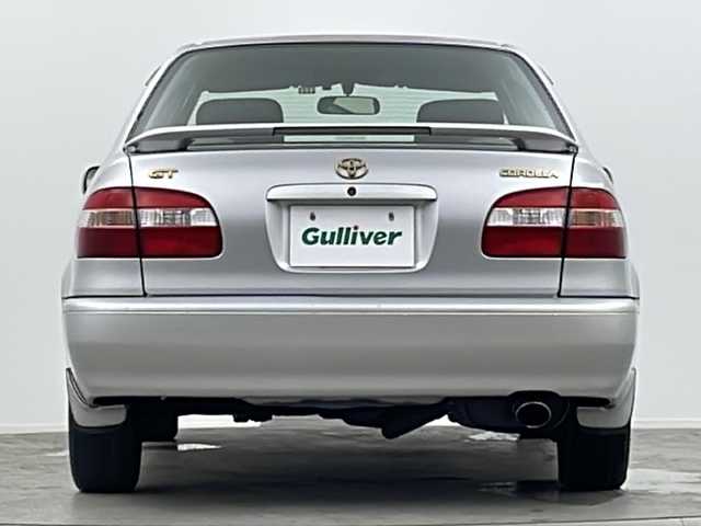 トヨタ カローラ GT 大阪府 1998(平10)年 17.3万km シルバーM CDユニット(MITSUBISHI/CDH77)/純正リアスポイラー/AAC/シガーライター/ハロゲンヘッドライト