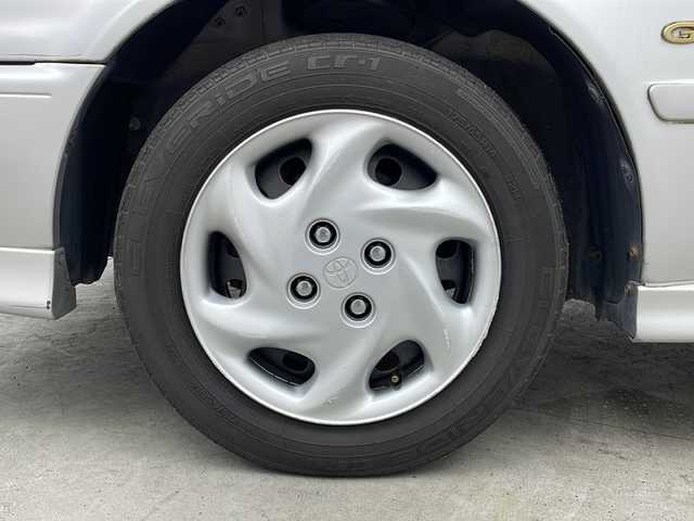 トヨタ カローラ GT 大阪府 1998(平10)年 17.3万km シルバーM CDユニット(MITSUBISHI/CDH77)/純正リアスポイラー/AAC/シガーライター/ハロゲンヘッドライト