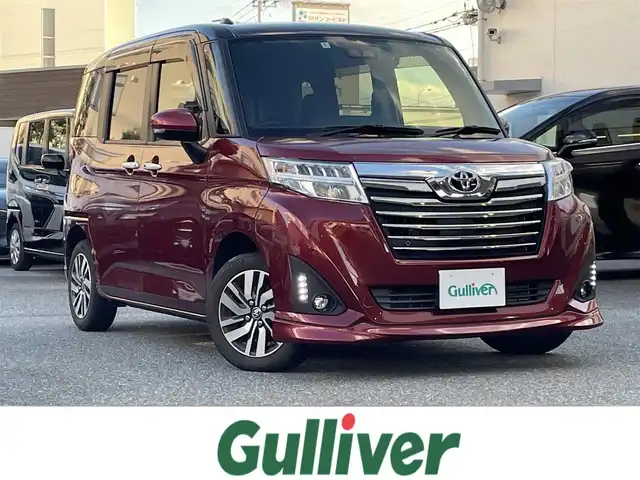 トヨタ ルーミー カスタムG 福岡県 2020(令2)年 2.1万km ブラックマイカメタリック/ファイアークォーツレッドメタリック ワンオーナー/純正ディーラーナビ（KSZT-Y68T）/Bluetooth対応/フルセグTV/AM/FM/9インチナビ/バックカメラ/フリップダウンモニター/両側パワースライドドア/ドライブレコーダー（前方）/ビルトインETC/クルーズコントロール/ドアバイザー/純正フロアマット/純正アルミホイール/プッシュスタート/保証書/取扱説明書/スペアキー/スマートキー