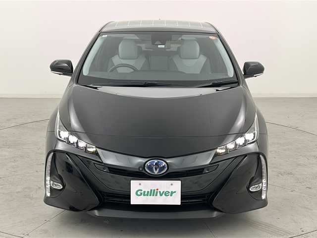 トヨタ プリウス ＰＨＶ A プレミアムナビパッケージ 宮城県 2020(令2)年 4.6万km アティチュードブラックマイカ 禁煙車/ワンオーナー/後期型/5人乗り/ソーラー充電システム/パノラミックビューモニター/JBLプレミアムサウンド/トヨタセーフティセンス/・プリクラッシュセーフティ/・レーントレーシングアシスト/・オートハイビームアシスト/・アダプティブクルーズコントロール/・ヘッドアップディスプレイ/・ブラインドスポットモニター/駐車支援システム/純正11.6インチナビ/・USB.BT.AUX/フルセグTV/白本革シート/・D席パワーシート/・前席シートヒーター/エアシート/純正ドライブレコーダー（F）/ビルトインETC2.0/LEDヘッドライト/LEDフォグランプ/ステアリングヒーター/ステアリングスイッチ/プッシュスタート/スマートキー/純正17インチアルミホイール/純正フロアマット/トノカバー