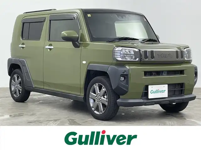 ダイハツ タフト G ターボ 大分県 2020(令2)年 5.6万km フォレストカーキメタリック 衝突被害軽減ブレーキ/純正ナビTV/（NMZK-W72D/CD/DVD/Bluetooth/フルセグTV)/純正バックカメラ/純正ドライブレコーダー/純正セキュリティアラーム/純正15インチアルミ/純正LEDオートライト/純正LEDフォグ/純正フロアマット/シートカバー/パノラマガラスルーフ/アダプティブクルーズコントロール/レーンキープアシスト/オートマチックハイビーム/クリアランスソナー/前席シートヒーター/本革巻ハンドル/オートエアコン/スマートキー/プッシュエンジンスタート/スペアキー、新車時保証書、取扱い説明書