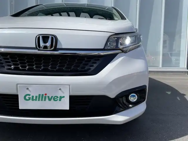 ホンダ フリード ハイブリット G ホンダセンシング 神奈川県 2020(令2)年 3.8万km プラチナホワイトパール MC後モデル/Cパッケージ/ワンオーナー/純正９インチナビＴＶ/（ＤＶＤ／Ｂｌｕｅｔｏｏｔｈ／ＳＤ／ＨＤＭＩ）/純正１１．６インチ後席モニター/(VM-185EN)/両側パワースライドドア/ACC(アダプティブクルーズコントロール)/LKAS（車線維持支援システム）/アクティブコーナリングライト/バックカメラ/純正LEDヘッド&フォグライト　/純正エンジンスターター/(RS-16Jシリーズ)/オートリトラミラー/ビルトインETC/R3/4/5/6点検記録