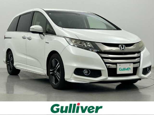 ホンダ オデッセイ ハイブリッド アブソルートセンシングEXパック 熊本県 2016(平28)年 8.3万km ホワイトオーキッドパール 純正ナビ（ＣＤ・ＤＶＤ・フルセグ・ＢＴ・ＳＤ）/バックカメラ　/純正フリップダウンモニター　/ビルトインＥＴＣ　/両側パワースライドドア　/レーダークルーズコントロール　/衝突軽減ブレーキ　/レーンキープアシスト/ブラインドスポットモニター/横滑り防止/オットマン/運転席パワーシート/ハーフレザーシート/オートライト/オートマチックハイビーム/LEDヘッドライト/フォグライト/スマートキー/プッシュスタート/スペアキー1本