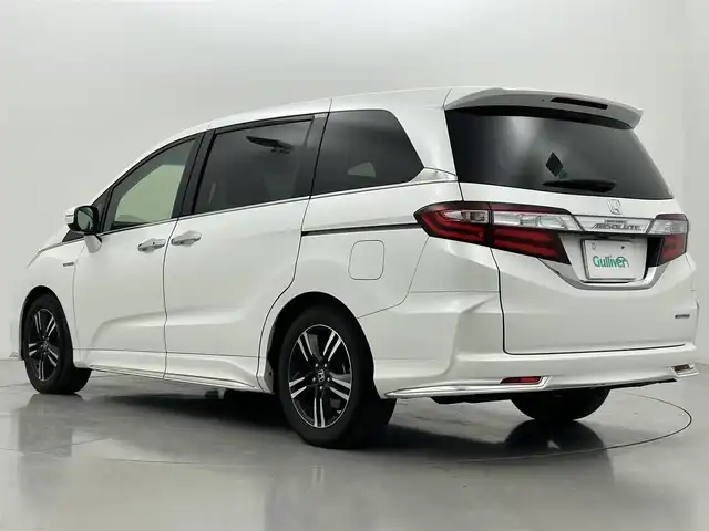 ホンダ オデッセイ ハイブリッド アブソルートセンシングEXパック 熊本県 2016(平28)年 8.3万km ホワイトオーキッドパール 純正ナビ（ＣＤ・ＤＶＤ・フルセグ・ＢＴ・ＳＤ）/バックカメラ　/純正フリップダウンモニター　/ビルトインＥＴＣ　/両側パワースライドドア　/レーダークルーズコントロール　/衝突軽減ブレーキ　/レーンキープアシスト/ブラインドスポットモニター/横滑り防止/オットマン/運転席パワーシート/ハーフレザーシート/オートライト/オートマチックハイビーム/LEDヘッドライト/フォグライト/スマートキー/プッシュスタート/スペアキー1本
