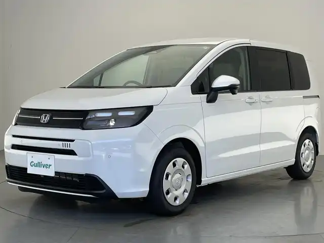 ホンダ フリード AIR 愛知県 2025(令7)年 0.1万km未満 プラチナホワイトパール 登録済未使用車　純正９型ナビ　フルセグＴＶ　Ｂｌｕｅｔｏｏｔｈ　カープレイ対応　バックカメラ　両側パワースライドア　ＬＥＤオートライト　ホンダセンシング　衝突軽減　追従クルコン　ハンドル支援　禁煙車/6人　9インチナビ　LXM-242ZFNI(207680円)