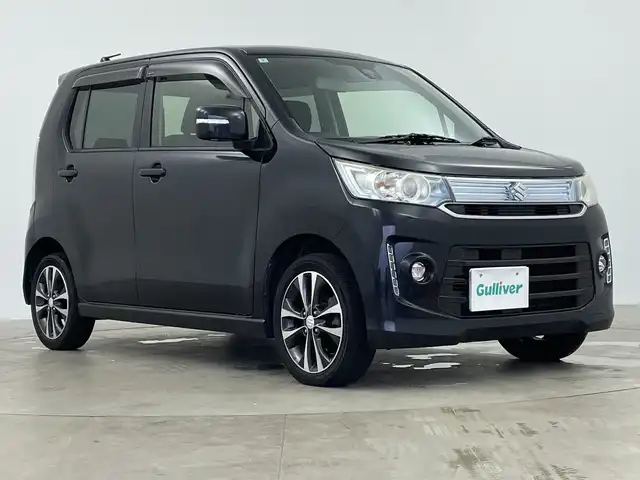 スズキ ワゴンＲ スティングレー T 鹿児島県 2016(平28)年 9.6万km ブルーイッシュブラックパール3 純正SDナビ/(BT/CD/DVD/AM/FM/ワンセグTV)/バックカメラ/クルーズコントロール/シートヒーター/ETC/ベンチシート/衝突軽減ブレーキ/アイドリングストップ/HDMI/フロントフォグライト/パドルシフト/純正15インチアルミホイール/純正ドアバイザー/純正フロアマット/スペアキー