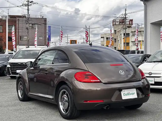 フォルクスワーゲン ザ・ビートル デザイン 熊本県 2014(平26)年 8.6万km グラシオーサブラウンメタリック 社外SDナビ（CN-R300D）/【フルセグTV/CD/DVD/SDオーディオ】/バックカメラ/純正16インチアルミホイール/HIDヘッドライト/ETC/ドライブレコーダー/フロアマット/取扱説明書/リモコンキー