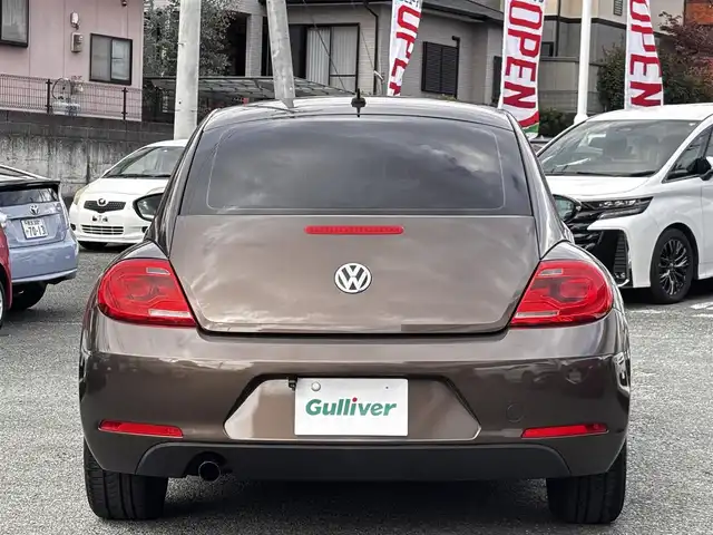 フォルクスワーゲン ザ・ビートル デザイン 熊本県 2014(平26)年 8.6万km グラシオーサブラウンメタリック 社外SDナビ（CN-R300D）/【フルセグTV/CD/DVD/SDオーディオ】/バックカメラ/純正16インチアルミホイール/HIDヘッドライト/ETC/ドライブレコーダー/フロアマット/取扱説明書/リモコンキー