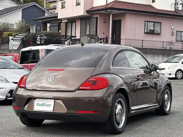 フォルクスワーゲン ザ・ビートル デザイン 熊本県 2014(平26)年 8.6万km グラシオーサブラウンメタリック 社外SDナビ（CN-R300D）/【フルセグTV/CD/DVD/SDオーディオ】/バックカメラ/純正16インチアルミホイール/HIDヘッドライト/ETC/ドライブレコーダー/フロアマット/取扱説明書/リモコンキー