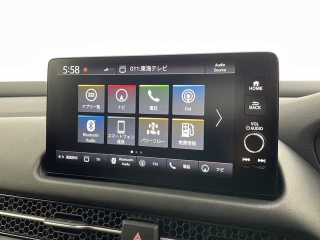 ホンダ ＺＲ－Ｖ ハイブリッド e:HEV Z 愛知県 2024(令6)年 0.3万km プラチナホワイトパール 純正9インチナビ/マルチビューカメラシステム/フルセグTV・Bluetooth/BOSEサウンド/ワイヤレス充電器/ETC2.0/本革シート/運転席助手席パワーシート/運転席助手席シートヒーター/ハンズフリーアクセステールゲート/純正18インチアルミホイール/ホンダセンシング/衝突軽減ブレーキ/先行車発進お知らせ/歩行者事故低減ステアリング/路外逸脱抑制/標識認識/渋滞追従機能付アダプティブクルーズコントロール/車線維持支援システム/トラフィックジャムアシスト(渋滞運転支援)/ブラインドスポットインフォメーション/後退出庫サポート/ヒルディセントコントロール/アダプティブドライビングビーム/LEDヘッドライト/オートライト/革巻きステアリング/パドルシフト/スマートキー/プッシュスタート/スペアキー/保証書・取扱説明書