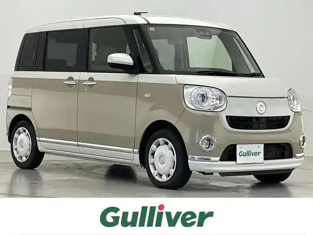 ダイハツ ムーヴ キャンバス G メイクアップ リミテッド　SAⅢ 滋賀県 2021(令3)年 3.9万km パールホワイトⅢ/ナチュラルベージュマイカメタリック 2トーン 禁煙車/社外7インチナビ【CD/DVD/Bluetooth】/全方位カメラ/衝突被害軽減システム/両側パワースライドドア/シートヒーター/ETC/アイドリングストップ/オートライト/オートハイビーム/ステアリングスイッチ/プッシュスタート/スマートキー
