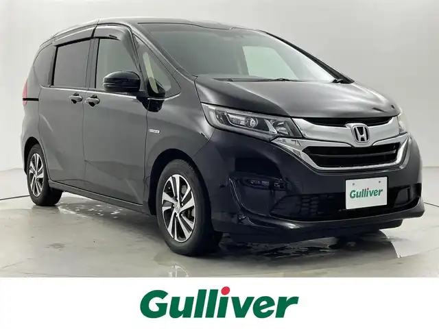 ホンダ フリード ハイブリット EX 福井県 2018(平30)年 4.5万km プレミアムスパークルブラックパール 両側パワースライドドア/純正ナビ　型式：VXM-194VFi/（Ｂｌｕｅｔｏｏｔｈ　フルセグＴＶ　ＣＤ　ＤＶＤ　ＦＭ　ＡＭ　）/シートヒーター/ハーフレザーシート/純正アルミホイール/純正フロアマット/純正ビルトインETC/ホンダセンシング/LEDヘッドライト
