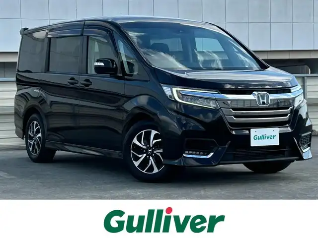 ホンダ ステップワゴン スパーダ ホンダセンシング 静岡県 2019(令1)年 3.9万km プレミアムスパークルブラックパール ホンダセンシング/純正7インチナビ/FM/AM/フルセグTV/Bluetooth/iPod/SD/3列シート（7人乗り）/追従クルーズコントロール/両側パワースライドドア/ターボエンジン/バックカメラ/ETC/純正フロアマット/LEDヘッドライト/オートライト/オートハイビーム/純正16AW
